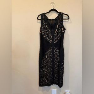 A classic Tadashi Shoji nude black lace dress